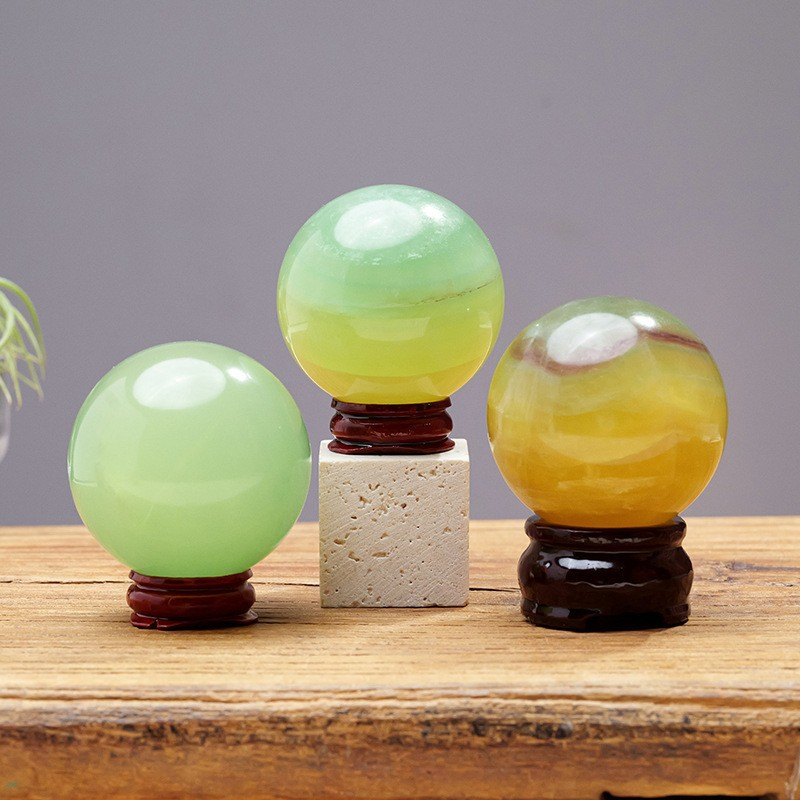 Mango Fluorite Sphere (Comes with a base) 